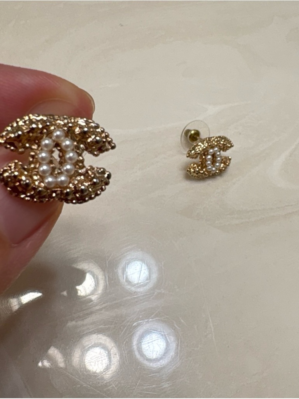 Gold Pearl Interlock Stud Earrings